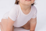 Flexisuit the 'one-size' onesie - Pastel Pink - Kollektive - Official distributor
