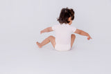Flexisuit the 'one-size' onesie - Pastel Pink - Kollektive - Official distributor